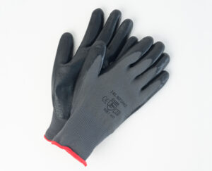 Black foam nitrile palm-coated gloves for dexterity, grip, oil resistance, and abrasion protection, ideal for material handling and assembly work