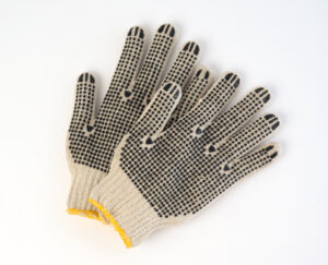 Poly/cotton string-knit gloves with dots on both sides, bleached white, ambidextrous